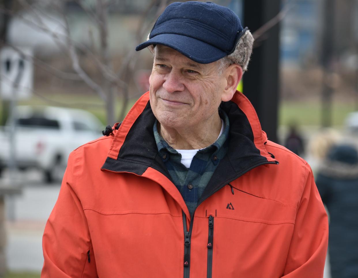 Former South Bend Mayor Stephen Luecke talks with city officials at an event commemorating the Stephen J. Luecke Coal Line Trail on Thursday, March 21, 2024. The city's longest-serving mayor, Luecke held office from 1997 to 2012.