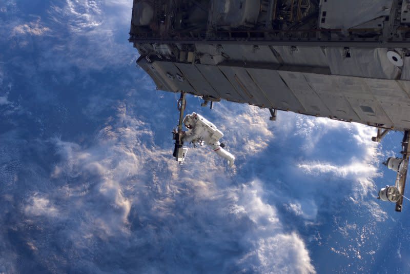 NASA astronaut Robert Curbeam works on the International Space Station's S1 truss during the space shuttle Discovery's STS-116 mission in December 2006. On March 9, 2011, the Discovery made its final landing at Kennedy Space Center. File Photo courtesy of NASA