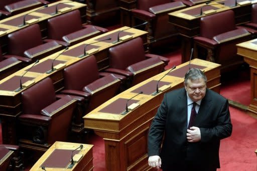 Greece's Socialist Party Leader Evangelos Venizelos leaves the Greek parliament after a swearing-in ceremony in Athens on May 17. His debt-stricken country topped the world agenda as leaders went into talks with US President Barack Obama