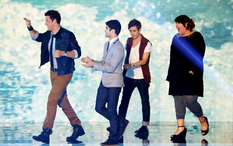 UNIVERSAL CITY, CA - AUGUST 07: (L-R) Actors Cory Monteith, Darren Criss, Kevin McHale, and Ashley Fink onstage during the 2011 Teen Choice Awards held at the Gibson Amphitheatre on August 7, 2011 in Universal City, California. (Photo by Kevin Winter/Getty Images)