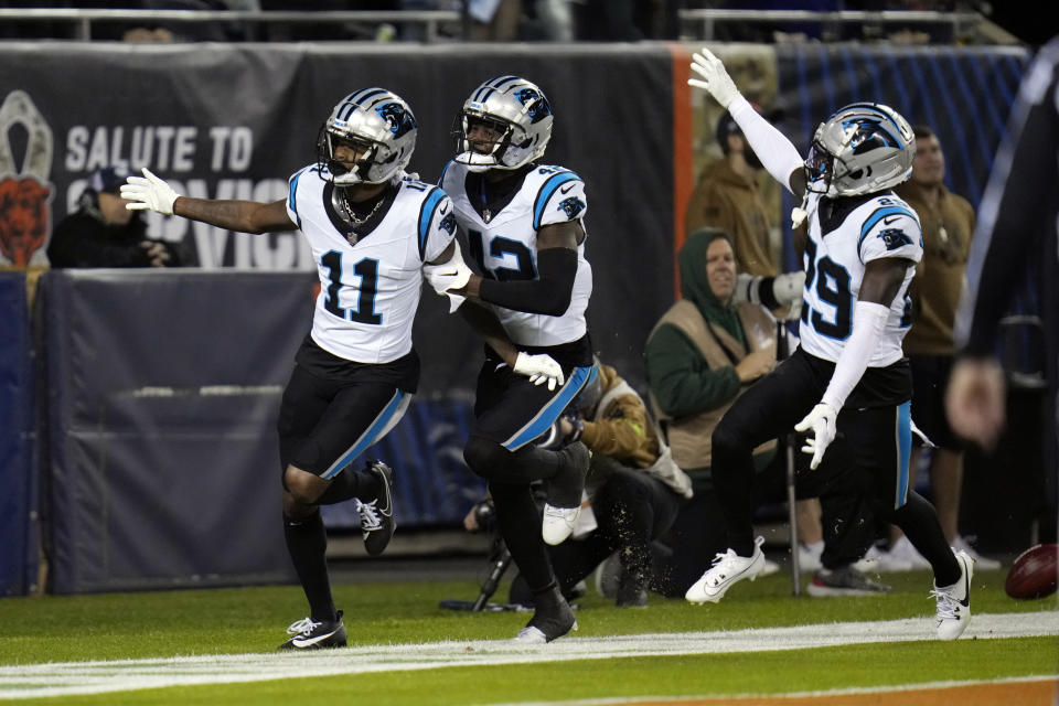 Carolina Panthers wide receiver Ihmir Smith-Marsette (11) celebrates after returning a punt for a touchdown during the first half of an NFL football game against the Chicago Bears, Thursday, Nov. 9, 2023, in Chicago. (AP Photo/Erin Hooley)