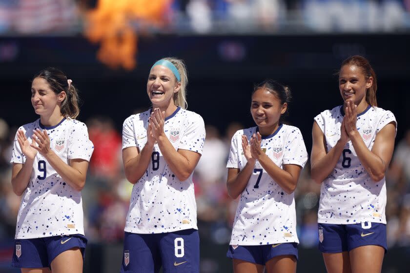 SAN JOSE, CALIFORNIA - JULY 09: United States players including Savannah DeMelo #9, Julie Ertz.