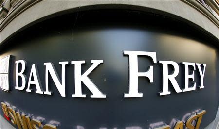 The logo of Swiss Bank Frey & Cois pictured at the entrance of an office building at the Bahnhofstrasse street in Zurich October 18, 2013. REUTERS/Arnd Wiegmann