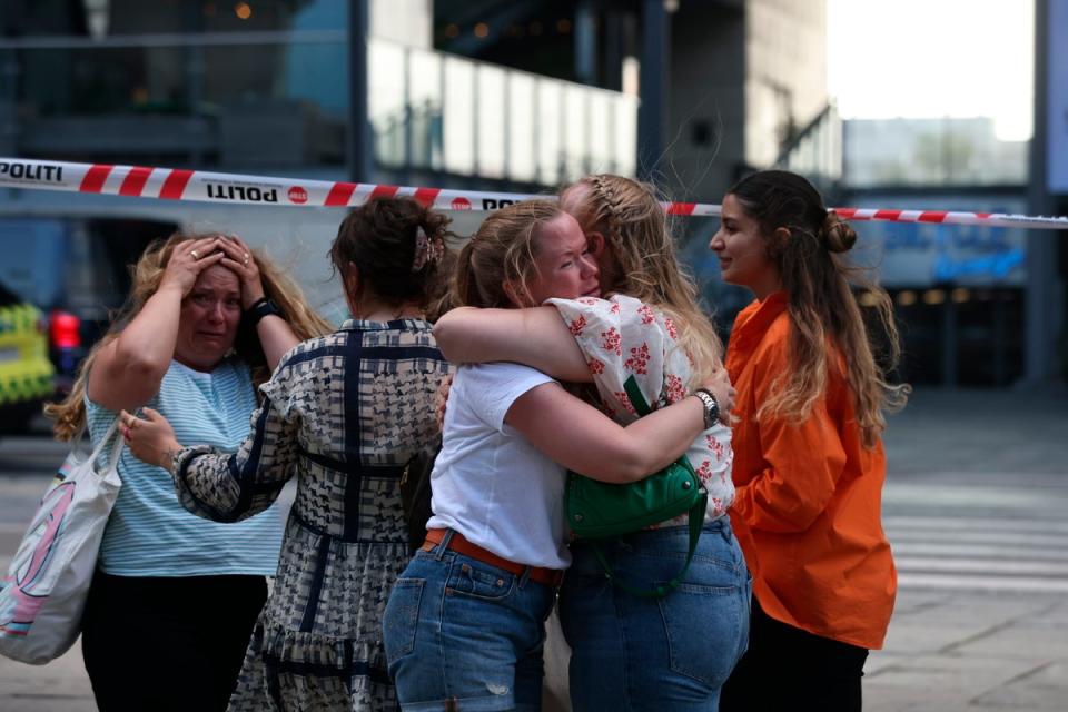 People react outside Field’s shopping centre in Copenhagen (Olafur Steinar Gestsson/Ritzau Scanpix via AP) (AP)