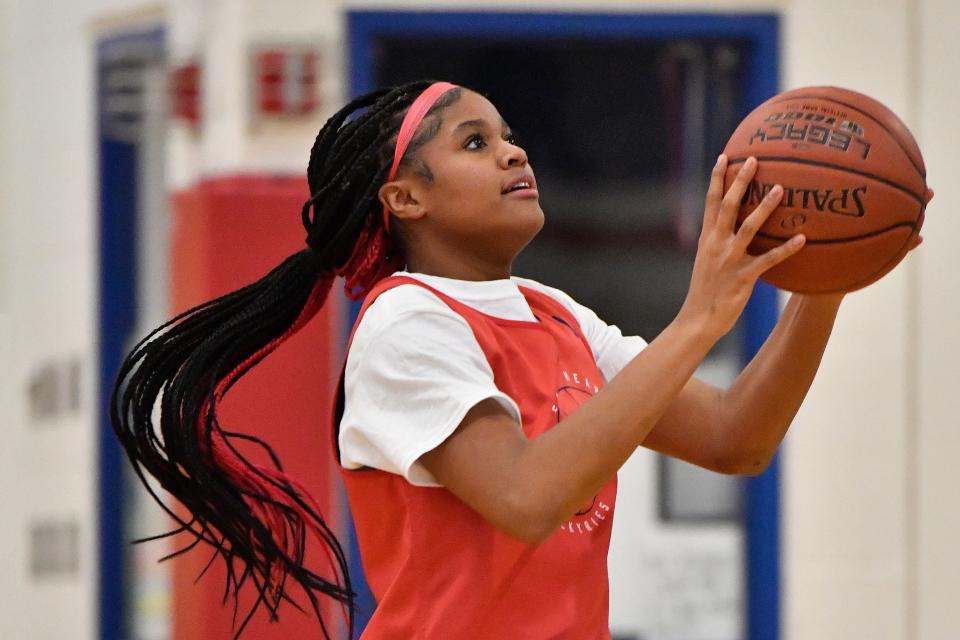 Sacred HeartÕs ZaKiyah Johnson (11) goes in for a layup during her teams practice at Sacred Heart High School, Thursday, Nov. 17 2022 in Louisville Ky.