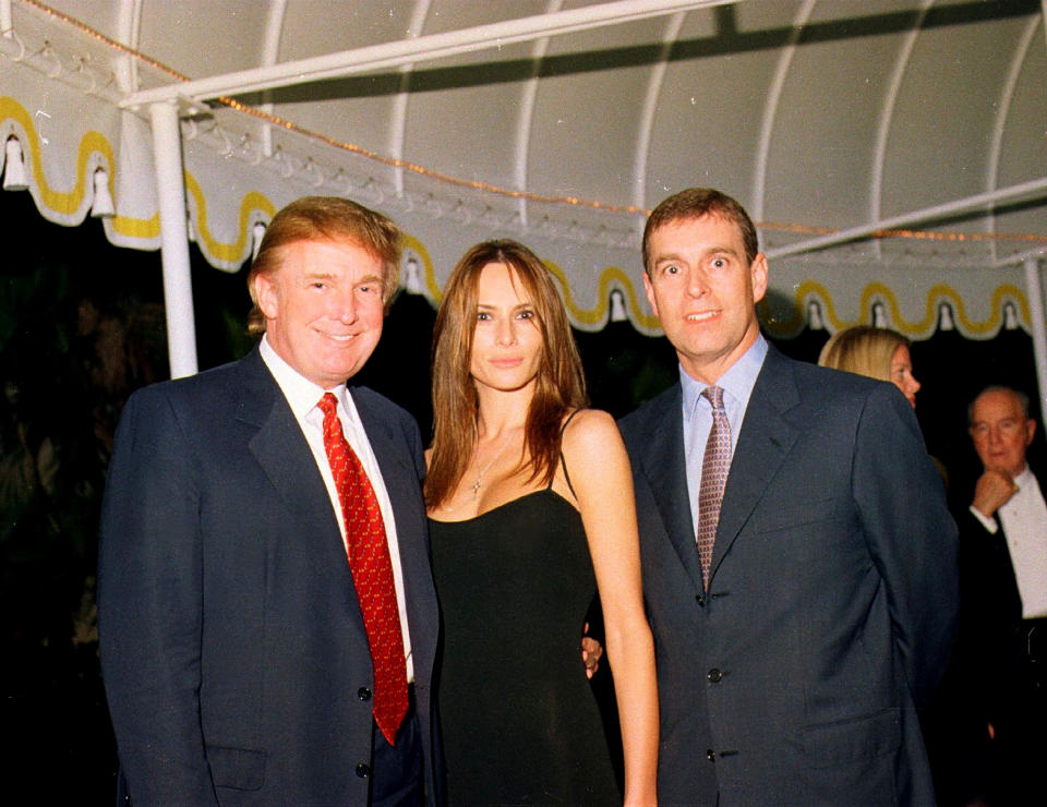 Portrait of, from left, American real estate developer Donald Trump, his girlfriend (and future wife), former model Melania Knauss, and British Prince Andrew, Duke of York, as they pose together at the Mar-a-Lago estate, Palm Beach, Florida, February 12, 2000. (Photo by Davidoff Studios/Getty Images)