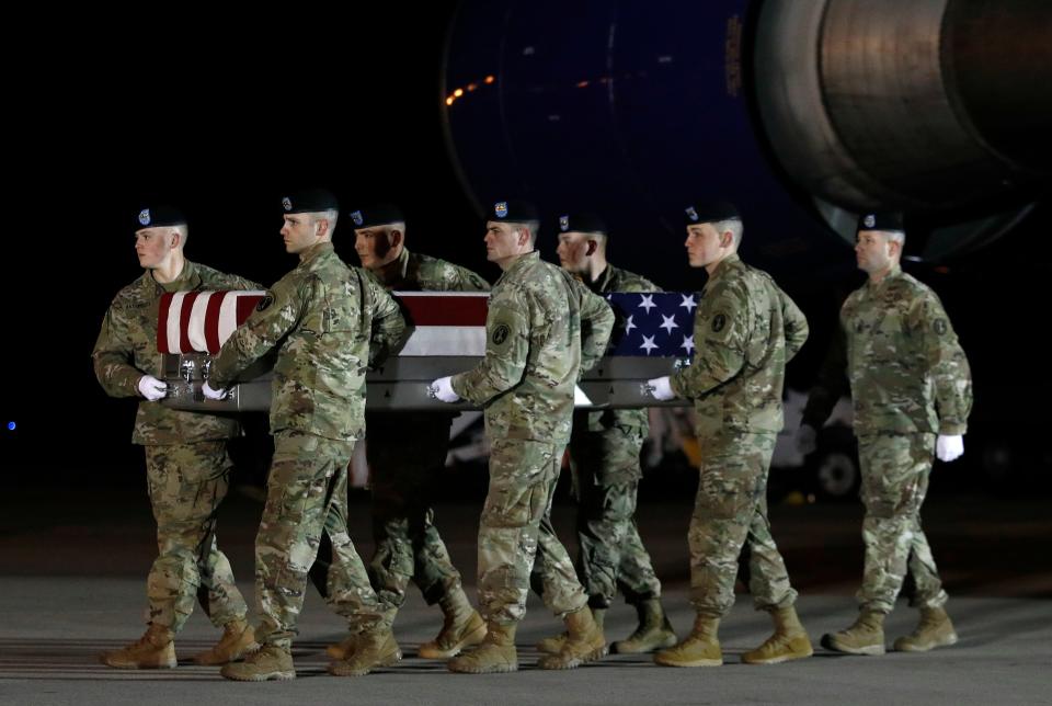 A U.S. Army carry team moves a transfer case containing the remains of Capt. Andrew P. Ross on Nov. 30, 2018, at Dover Air Force Base, Del. According to the Department of Defense, Ross, 29, of Lexington, Va., was killed Nov. 27, 2018, by a roadside bomb in Andar, Ghazni Province, Afghanistan.