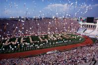 <p>There was a lot of anticipation building up to the opening of the 1984 Summer Olympics. A countdown clock in the stadium marked the exact start, with cannons and church bells ringing throughout the city the exact moment the ceremonies started. Then, over 1,000 volunteers gathered in formation to spell out "Welcome," which was also the name of the song created just for the 1984 Summer Olympics. After that, "Rocket Man" Bill Suitor traveled through the stadium with a jet pack while a skywriter spelled out another "Welcome" overhead. </p>