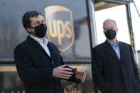 Transportation Secretary Pete Buttigieg, joined by Sen. Chris Van Hollen, D-Md., speaks to media after touring a UPS Facility in Landover, Md., Monday, March 15, 2021. Buttigieg was on hand to highlight COVID-19 vaccine distribution distribution efforts. (AP Photo/Carolyn Kaster)