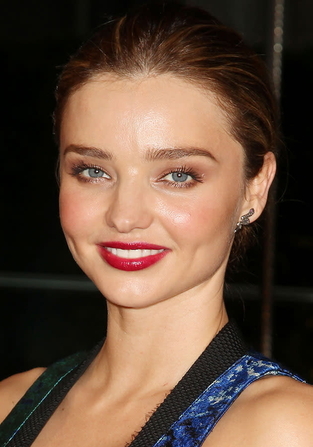 Miranda Kerr looked amazing with a dark red pout. [Rex]