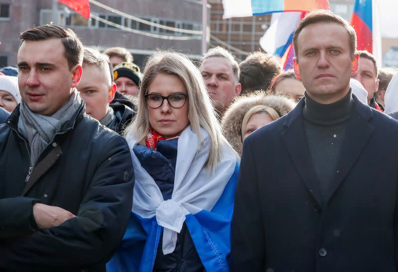 FILE PHOTO: Russian opposition politicians Navalny, Sobol and Zhdanov take part in a rally to mark the 5th anniversary of opposition politician Boris Nemtsov's murder and to protest against proposed amendments to the country's constitution, in Moscow