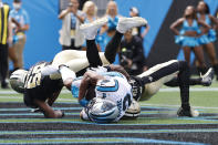 Carolina Panthers wide receiver D.J. Moore scores against the New Orleans Saints during the first half of an NFL football game Sunday, Sept. 19, 2021, in Charlotte, N.C. (AP Photo/Nell Redmond)