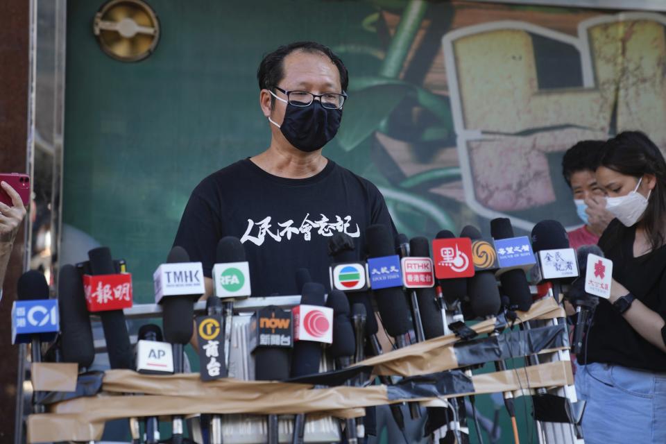 Spokesperson of Hong Kong Alliance in Support of Patriotic Democratic Movements of China, Richard Tsoi speaks to media after the group announced that it's disbanded in Hong Kong, Saturday, Sept. 25, 2021. (AP Photo/Kin Cheung)