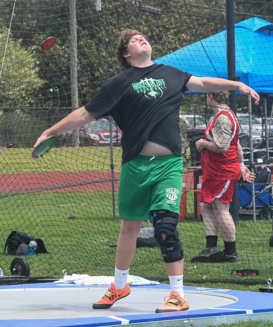 Hokes Bluff's Ian Stinson throws at the Etowah County schools track and field meet on Wednesday, April 13, 2022 in Gadsden, Alabama. Ehsan Kassim/Gadsden Times.