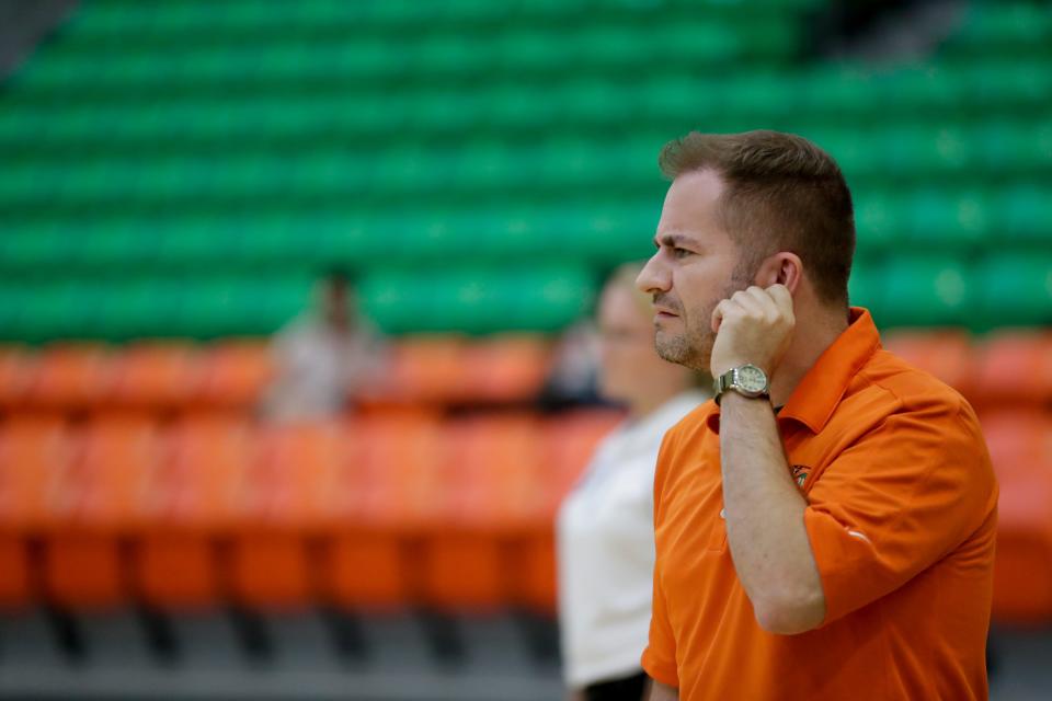 Florida A&M volleyball head coach Gokhan Yilmaz keeps a sharp eye on the action during a match versus Mercer at the Al Lawson Center Tuesday, Sept. 3, 2019.