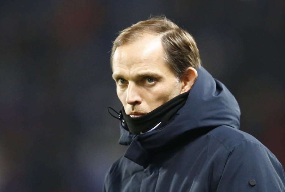 PSG coach Thomas Tuchel arrives on the pitch prior to the French Cup soccer match between Paris Saint Germain and Strasbourg at the Parc des Princes stadium in Paris, Wednesday, Jan. 23, 2019. (AP Photo/Michel Euler)