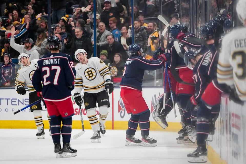 Nov 27, 2023; Columbus, Ohio, USA; Teammates celebrate a goal by Columbus Blue Jackets right wing Yegor Chinakhov (59) during the second period of the NHL game against the Boston Bruins at Nationwide Arena.