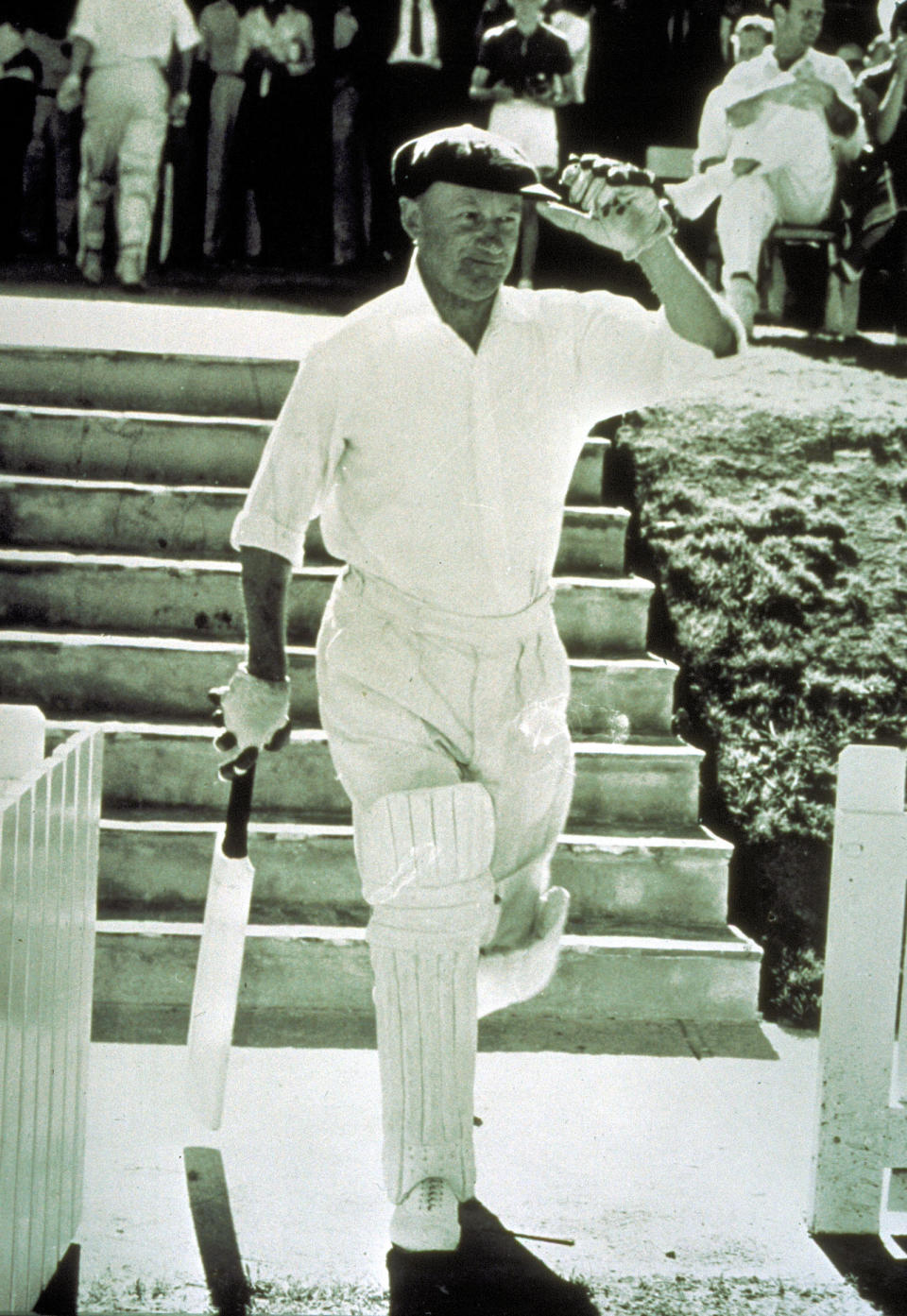 Sir Donald Bradman of Australia walks toward the wicket while playing for PM XI in Canberra, Australia in 1963.