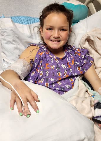 <p>Jessica Calvillo</p> Adalynn smiling in hospital