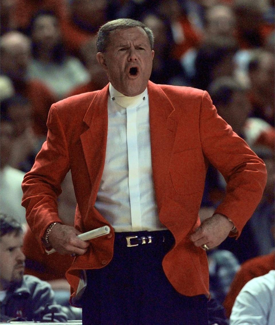 Louisville coach Denny Crum yells instructions to his players during the first half of their game against Utah Thursday night, Jan. 6, 2000, in Louisville, Ky. 