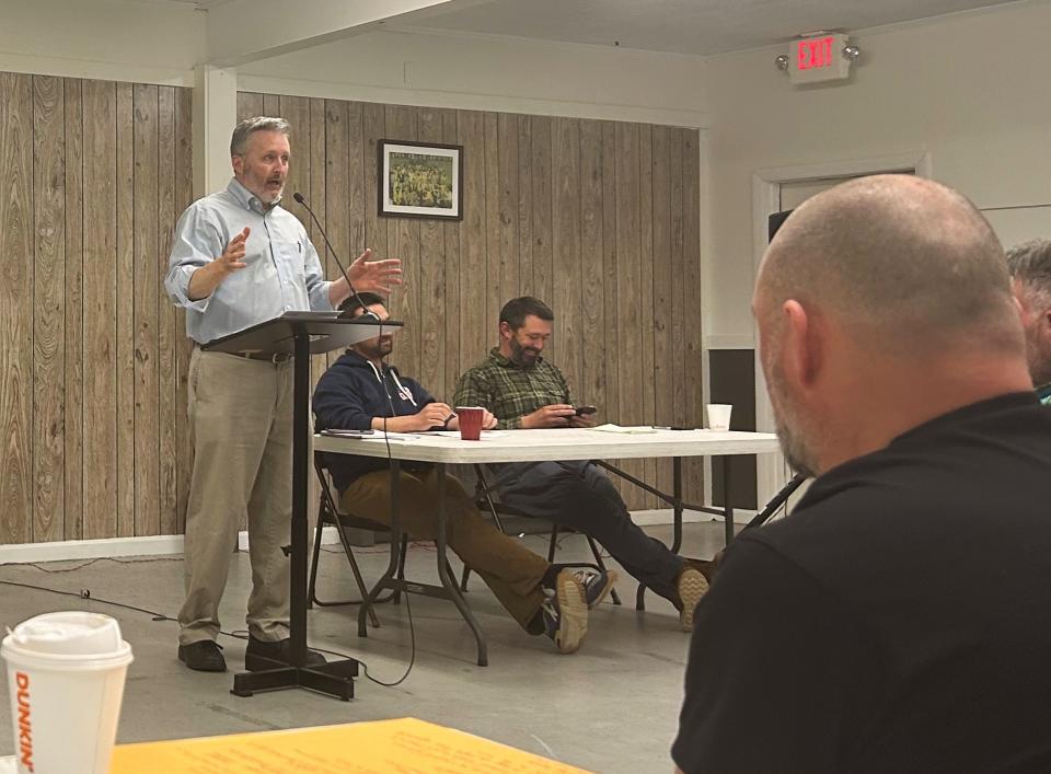  Scott Cuddy, director of policy for the Maine Labor Climate Council, speaks to Searsport residents about the possible job opportunities available with the new offshore wind port. (AnnMarie Hilton/ Maine Morning Star)