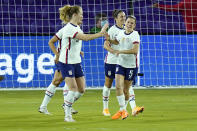 United States midfielder Samantha Mewis, left, celebrates after scoring a goal against Colombia with defender Kelly O'Hara, right, during the first half of an international friendly soccer match, Monday, Jan. 18, 2021, in Orlando, Fla. (AP Photo/John Raoux)
