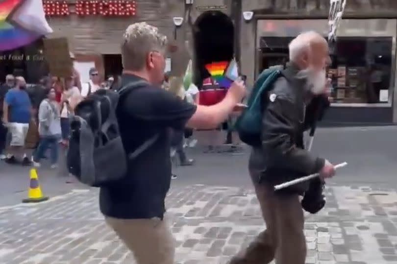 guy pranking protestor