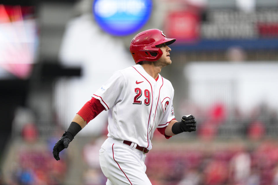Cincinnati Reds' TJ Friedl (29) rounds the bases after hitting a solo home run against the Chicago Cubs in the third inning of a baseball game in Cincinnati, Tuesday, April 4, 2023. (AP Photo/Jeff Dean)