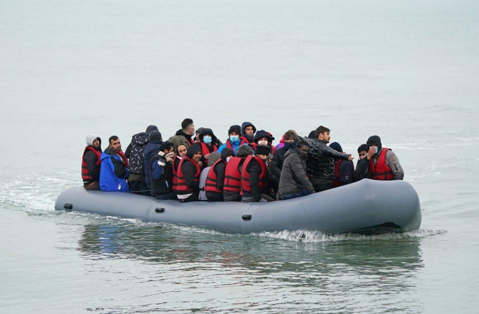 A dinghy arrives on a beach in Kent as people continue to risk death for a better life (Gareth Fuller/PA) (PA Wire)