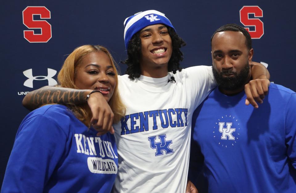 Stepinac's Boogie Fland was flanked by his mom, Shakima Smith, and dad, John Flan, when he announced that he will be attending the University of Kentucky next year during a press conference at Archbishop Stepinac High School in White Plains Oct. 20, 2023.