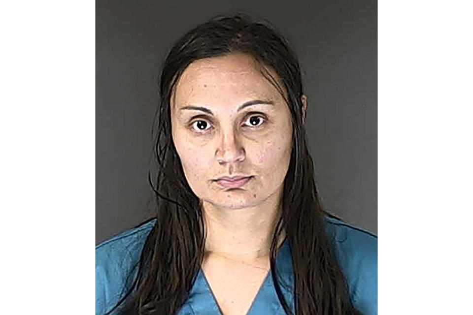 FILE - This March 5, 2020 booking photo provided by the El Paso County, Colo., Sheriff's Office shows Letecia Stauch. A prosecutor says Stauch knew what she was doing when she stabbed her young stepson 18 times and then shot him in the head before driving across the country to dump a suitcase with his remains inside over the side of a bridge in the Florida Panhandle. The statement came Monday, April 3, 2023, at the start of the murder trial of Stauch, over three years after Gannon Stauch was killed. (El Paso County Sheriff's Office via AP, File)