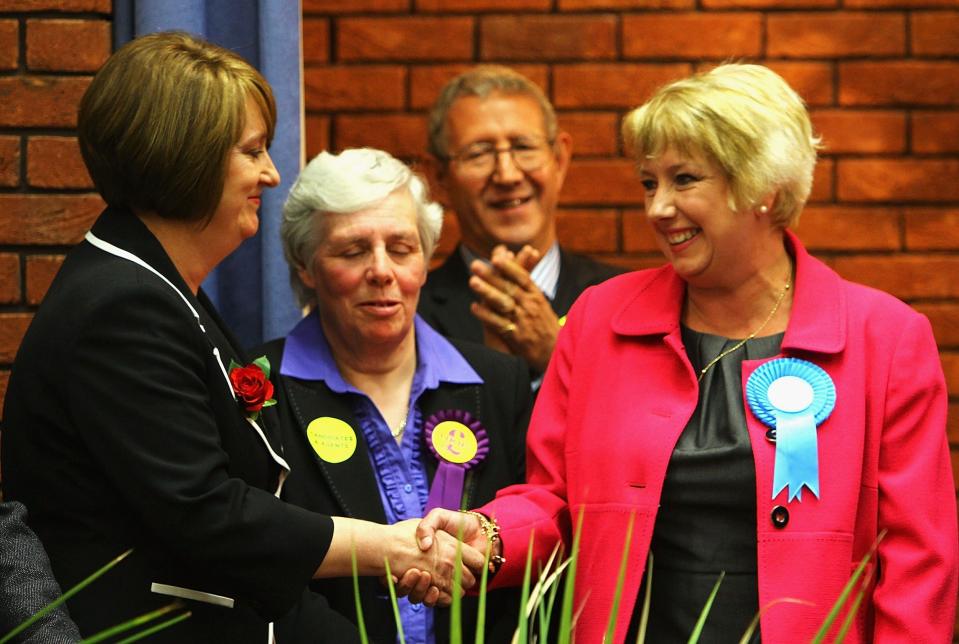 Jacqui Smith, left, of Labour congratulates Karen Lumley of the Conservatives on her success in winning, at the 2010 General Election Count, Redditch Town Hall - Matthew Lewis/Getty