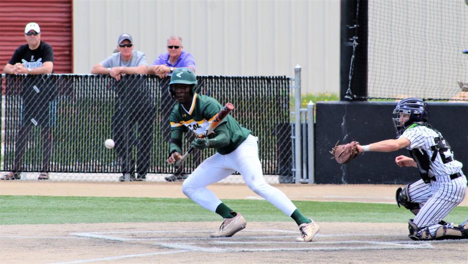 Pueblo County's Braxton Vail lays down a bunt attempt in the first inning against Lutheran in the CHSAA Class 4A state baseball tournament held at Cheyenne Mountain High School on May 27, 2023.