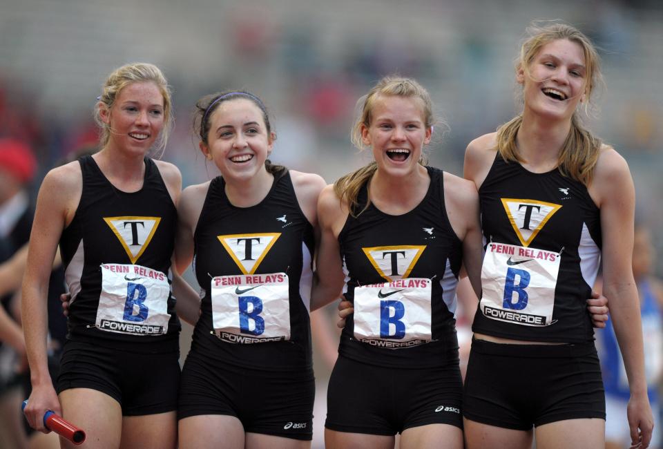 Members of the Tatnall girls distance medley relay react after setting a meet record of 11:28.86 in the Championship of America race in the 118th Penn Relays at Franklin Field in 2012. From left: Haley Pierce and Julie Williams and Reagan Anderson and Lindsay Voltz.