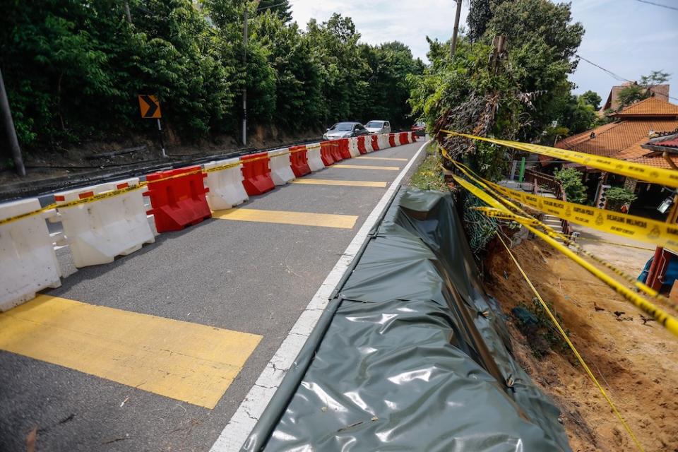 General view of the cordoned-off site where a retaining wall of a hotel collapsed, killing four, in Tanjung Bungah June 26, 2019. — Picture by Sayuti Zainudin