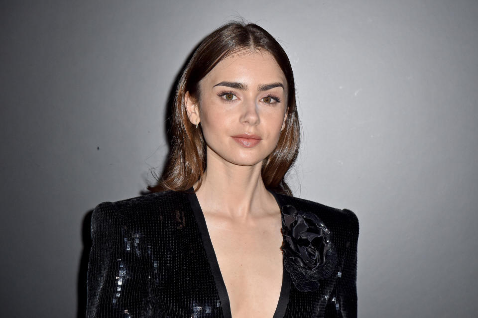 PARIS, FRANCE - FEBRUARY 25: (EDITORIAL USE ONLY) Lily Collins attends the Saint Laurent show as part of the Paris Fashion Week Womenswear Fall/Winter 2020/2021 on February 25, 2020 in Paris, France. (Photo by Dominique Charriau/WireImage)