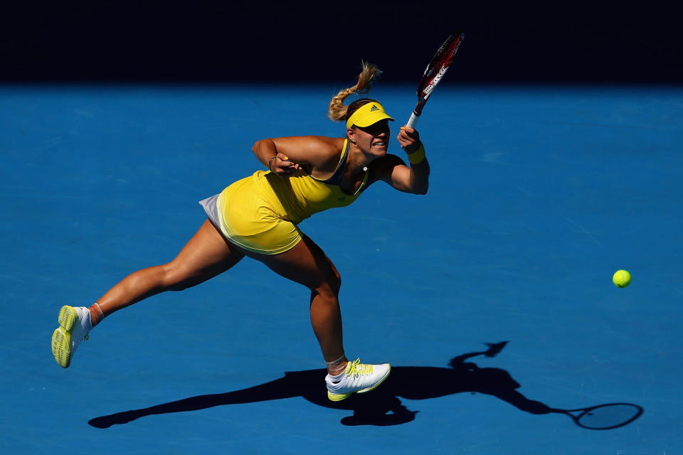 Angelique Kerber of Germany plays a backhand in her fourth round match against Ekaterina Makarova of Russia during day seven of the 2013 Australian Open at Melbourne Park on January 20, 2013 in Melbourne, Australia.