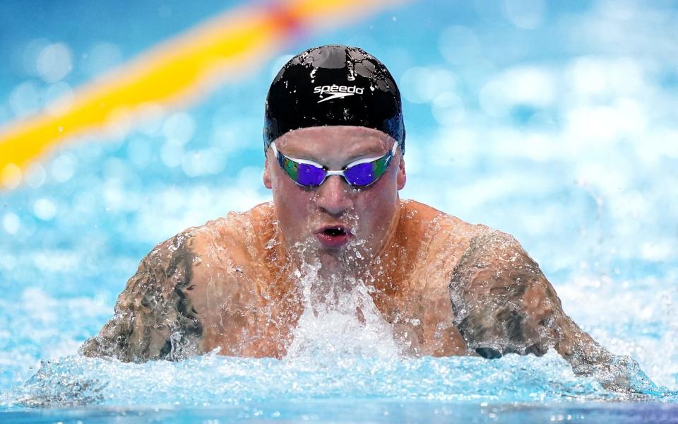 Adam Peaty in action during the Men's 100 Breaststroke Final during day one of the 2024 British Swimming Championships at the London Aquatics Centre, London