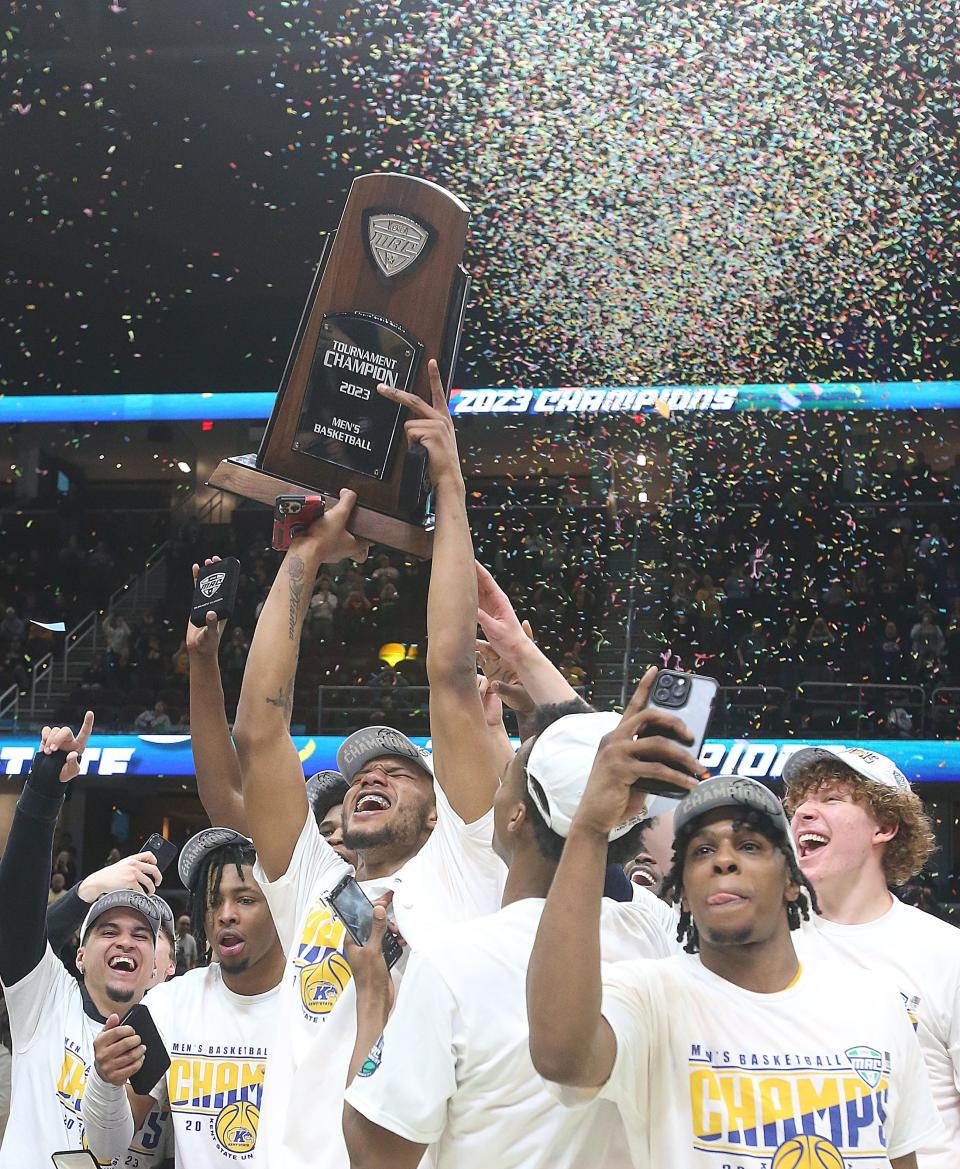 Kent State celebrates their 93-78 win over Toledo in the MAC championship game on Saturday, March 11, 2023 in Cleveland, Ohio, at Rocket Mortgage FieldHouse.