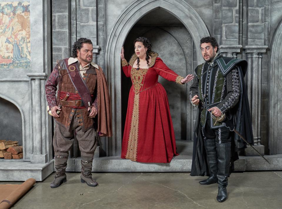 In the Verdi opera “Ernani,” Rafael Davila, left, and Ricardo Jose Rivera, play romantic rivals for the attentions of Elvira, played by Aviva Fortunata at the Sarasota Opera.