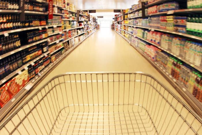 grocery cart moving through aisles