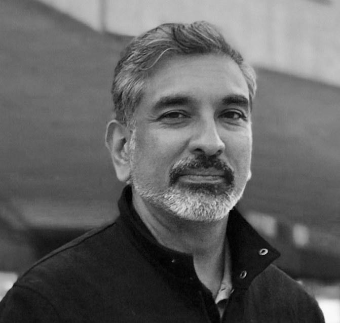 The India-born architect and urban theorist credits his immigrant background with helping him become an expert in "reading culture"