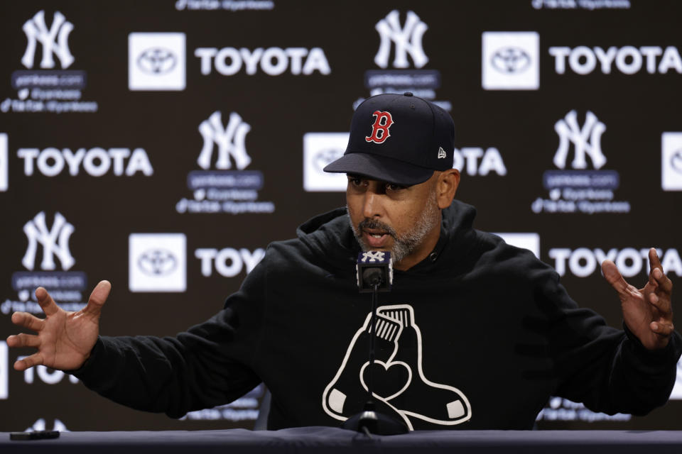 Boston Red Sox manager Alex Cora speaks to reporters on Thursday, April 7, 2022, in New York. The Red Sox will face the New York Yankees in a baseball game on Friday. (AP Photo/Adam Hunger)