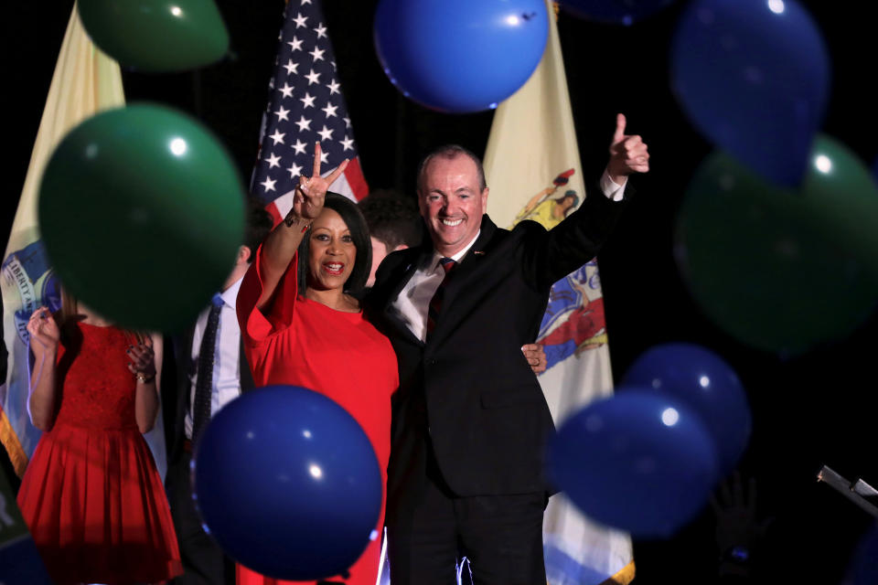 Phil Murphy, Governor-elect of New Jersey, and Shiela Oliver, Lieutenant Governor-elect, wave to supporters at their election night victory rally in Asbury Park, New Jersey on November 7, 2017. (Photo: Dominick Reuter/Reuters)