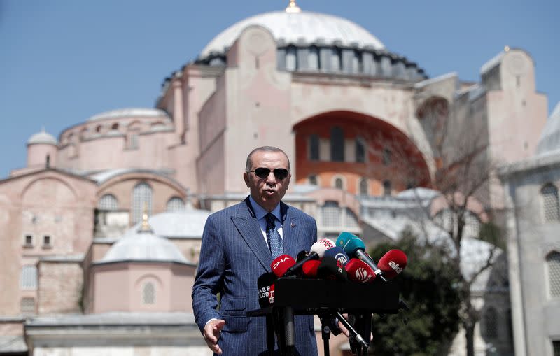 FILE PHOTO: Turkish President Erdogan talks to the media after attending Friday prayers at Hagia Sophia Grand Mosque in Istanbul