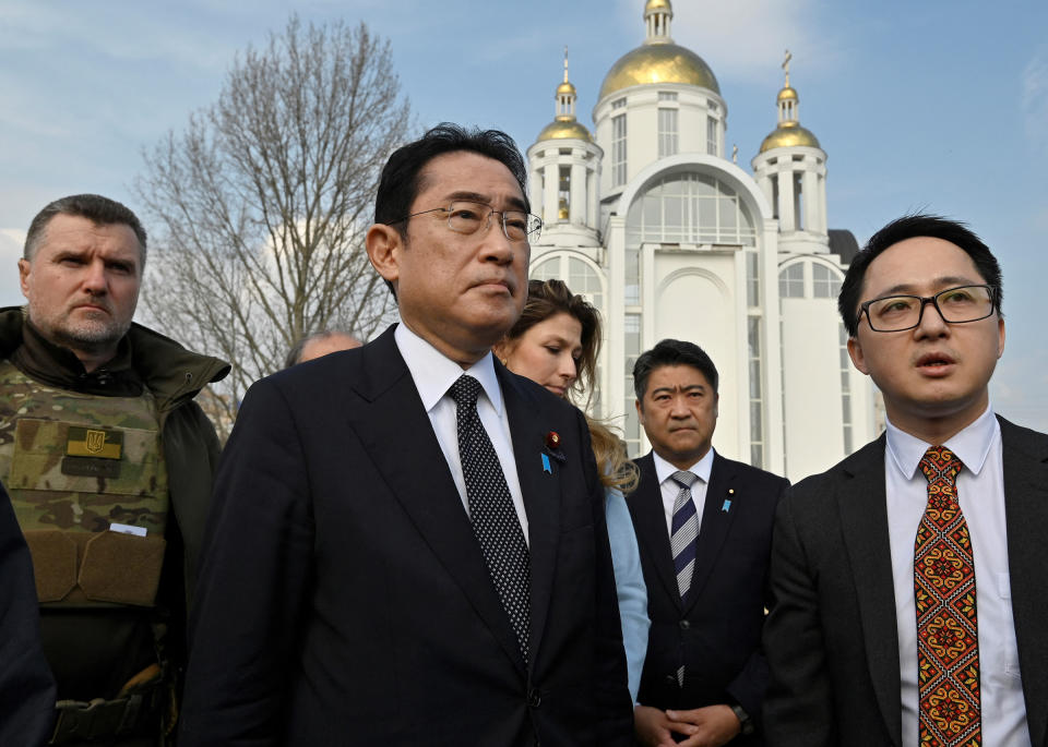 Kishida visits a mass grave site discovered at Church of St. Andrew and Pyervozvannoho All Saints in Bucha, Ukraine, on March 21.<span class="copyright">Sergei Chuzavkov—AFP/Getty Images</span>