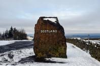 Snow blankets the ground at the border between England and Scotland, near Jedburgh. (AFP via Getty Images)