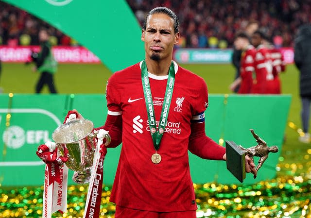 Liverpool captain Virgil van Dijk with the Carabao Cup and man of the match award