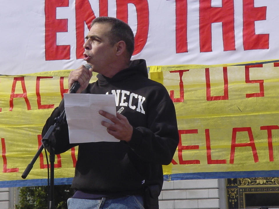 This Oct. 27, 2007, photo provided by Antiwar.com shows its co-founder Justin Raimondo in San Francisco. Raimondo, a longtime gay rights advocate and antiwar activist, has died. He was 67. Friend Eric Garris said Sunday, June 30, 2019, that Raimondo died Thursday, June 27, after battling lung cancer. (Yoshinori Abe via AP)