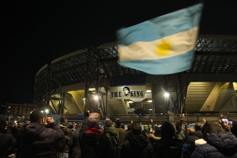 <p>Fans have gathered outside the stadium to pay their respects</p>AFP via Getty Images